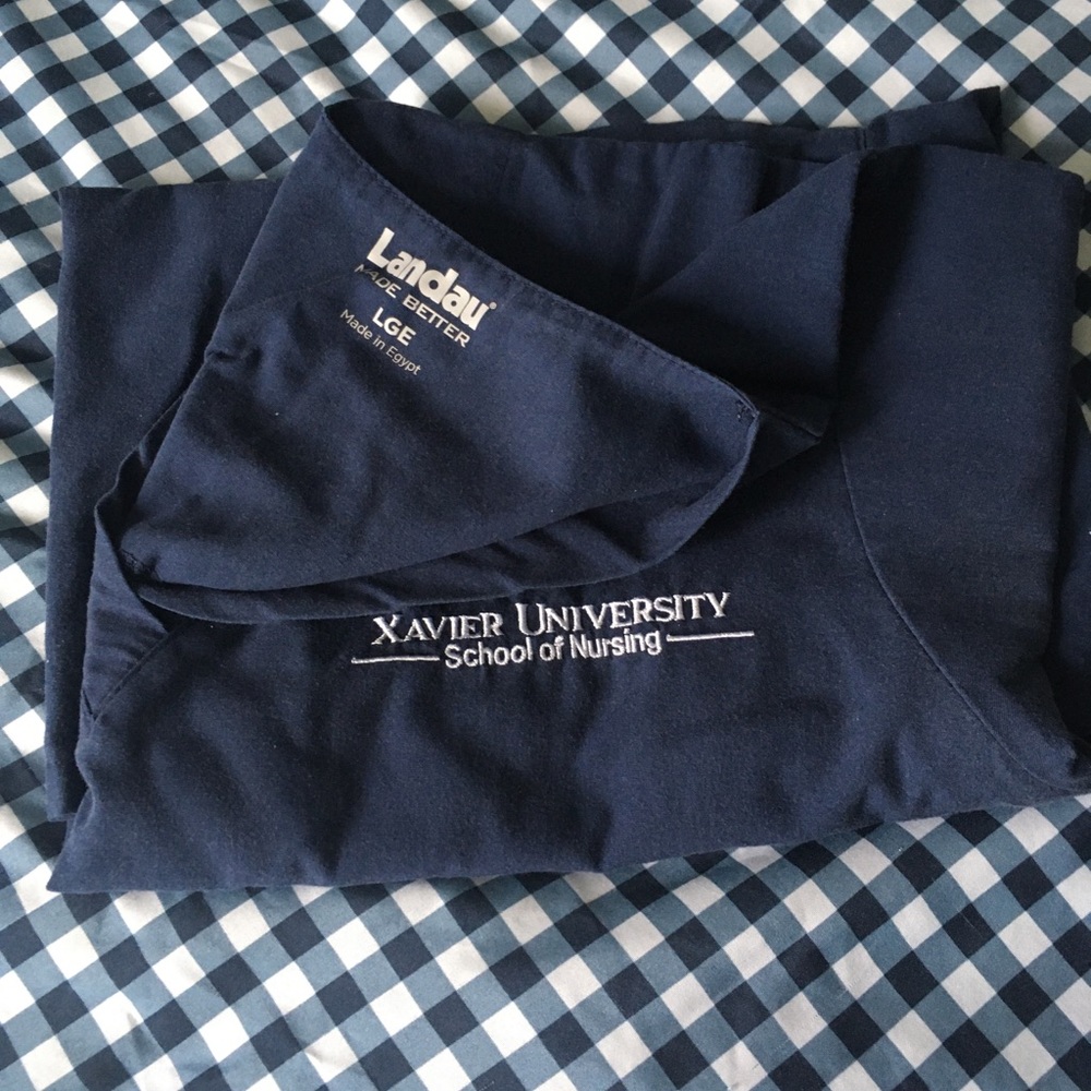 Xavier University scrub top and jacket
